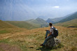 © Аrtranq - The man looking to the majestic mountais view