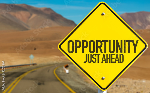 Fotomural Opportunity Just Ahead sign on desert road