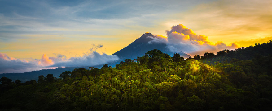 arenal volcano at sunrise...a rare sight at the perfect 15 second window to capture sunrise in all o