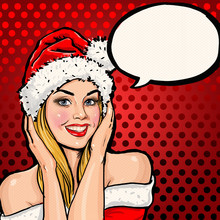 Girl In Santa Hat With Speech Bubble On Red Background.Christmas Santa Hat Woman Portrait .Smiling Happy Girl. Blond Girl In Santa Hat. Christmas Party Poster. New Year 