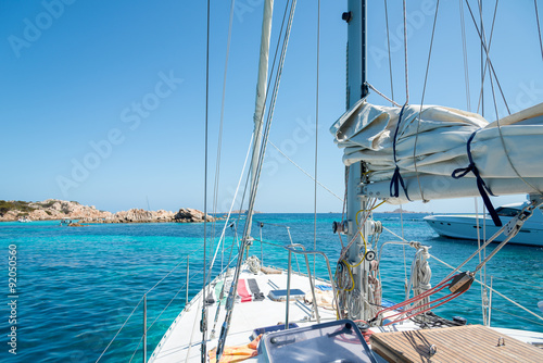 Naklejka - mata magnetyczna na lodówkę Sailboat at anchor, Porto della Madonna, Maddalena Archipelago, Sardinia, Italy