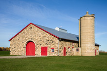 Retro Stone Barn With Bright Red Doors