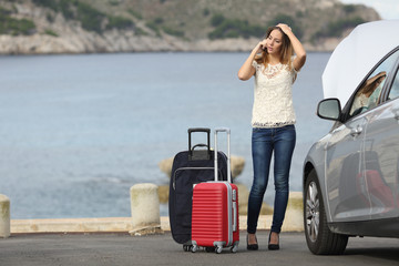 Sticker - Worried traveler woman calling assistance with a breakdown car