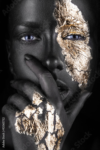 Fototapeta do kuchni fashion portrait of a dark-skinned girl with gold make-up