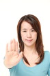 Japanese woman making stop gesture