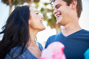 Wall Mural - happy romantic couple on date with cotton candy