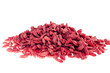 a lot of of red goji berry  on white background close up