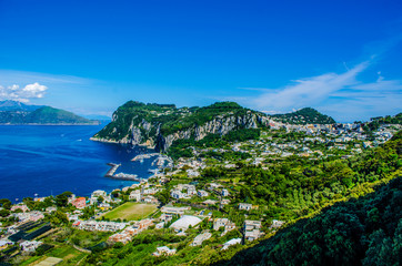 aerial view of italian holiday island capri, which combines beautiful nature spreadin over two hills and two tiny cities among them