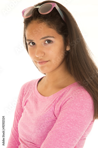 Fotografie, Obraz Cute Latino girl in a vertical portrait wearing a pink blouse