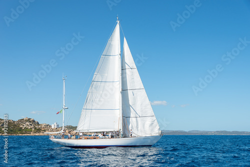 Fotografia Elegant old italian style sailboat, on a wonderful blue sea, Sardinia, Italy