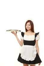 Young Japanese Woman Wearing French Maid Costume With Tray