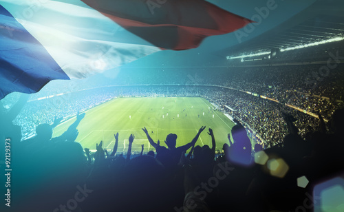 Fotografía crowded football stadium with french flag