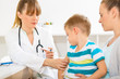 © cherryandbees - Little boy at the doctors appointment getting vaccinated