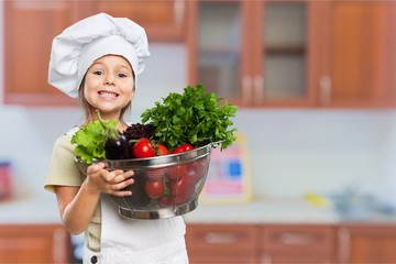 Wall Mural - Child cooking.