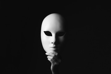 mask in hand.halloween