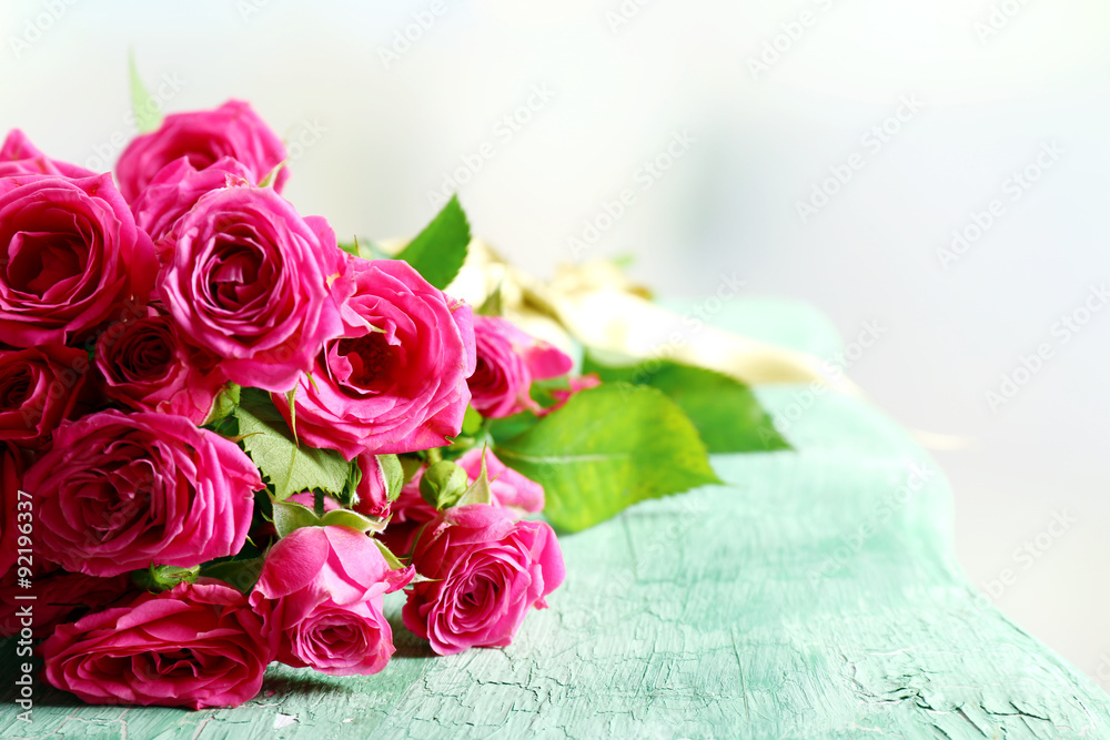 Beautiful roses on bright background