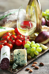 Fototapete - Still life with various types of Italian food and wine