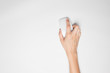 © aradaphotography - A female(woman) hand hold a mouse isolated white at the studio.