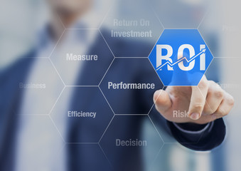 Businessman using ROI Return on Investment indicator for improvement