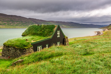 Wall Mural - Cottage covered with grass on the roof in Iceland