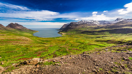 Wall Mural - Valley stretching from the Arctic sea to the mountains in Iceland