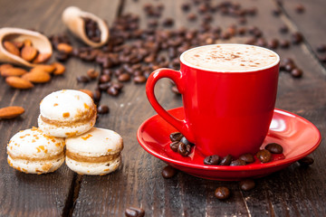 Wall Mural - Red cup of coffee and macaroon