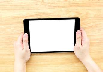 Poster - Hand holding tablet on table top,Mock up for adding your design