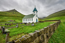 Small Village Church With Cemetery In Gjogv, Faroe Islands, Denm