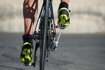 Wall Mural - Racing- bike detail on gear wheels and feet