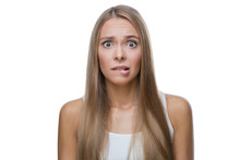 Portrait Of Shocked Woman On White Background