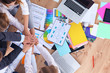 © lenets_tan - Business team with hands together - teamwork concepts