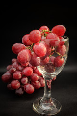 Wall Mural - Fresh grapes on wine glass