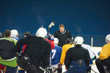 Wall Mural - ice hockey players team meeting with trainer