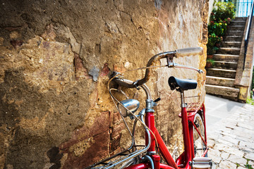 Wall Mural - Abandoned bike on the Italian street in the old Tuscany