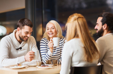 happy couple meeting and drinking tea or coffee