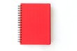 © sweetsake - spiral red notebook on white background