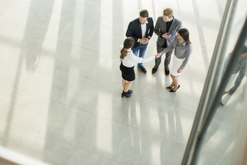 Wall Mural - People at the hall in office building