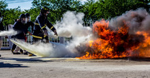 Firefighters Fighting Fire During Training