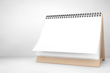 Fototapete - Blank paper desk spiral calendar