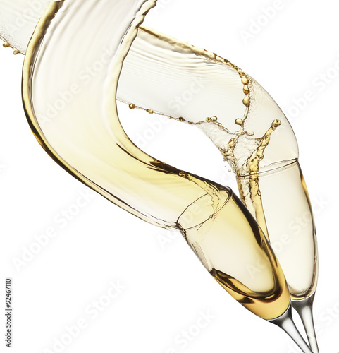 Vászonkép champagne splashes from glasses isolated on the white background