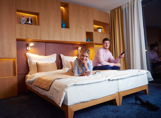 Wall Mural - young couple in modern hotel room