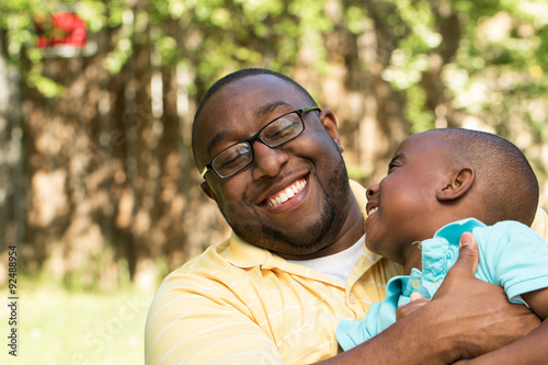Fotografija  African American father and son.