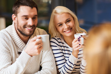 Canvas Print - happy couple meeting and drinking tea or coffee