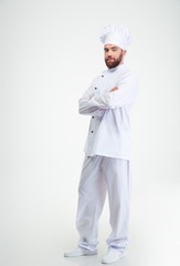 Wall Mural - male chef cook standing with crossed hands