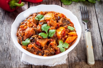 Stewed vegetables in a white bowl