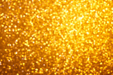 Wall Mural - Small warm bright golden lights bokeh background