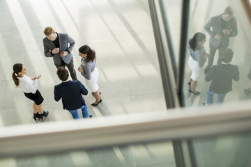 Wall Mural - People at the hall in office building