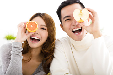 happy Young couple showing healthy food