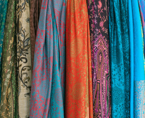 Wall Mural - Colorful scarves hanging in the market