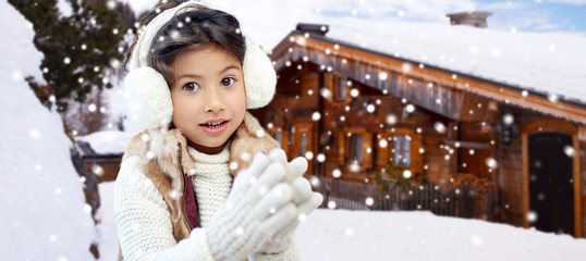 Sticker - happy little girl wearing earmuffs